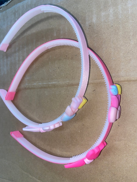 J4 DIADEMA CON PIN DE MOÑO 559 12PZ